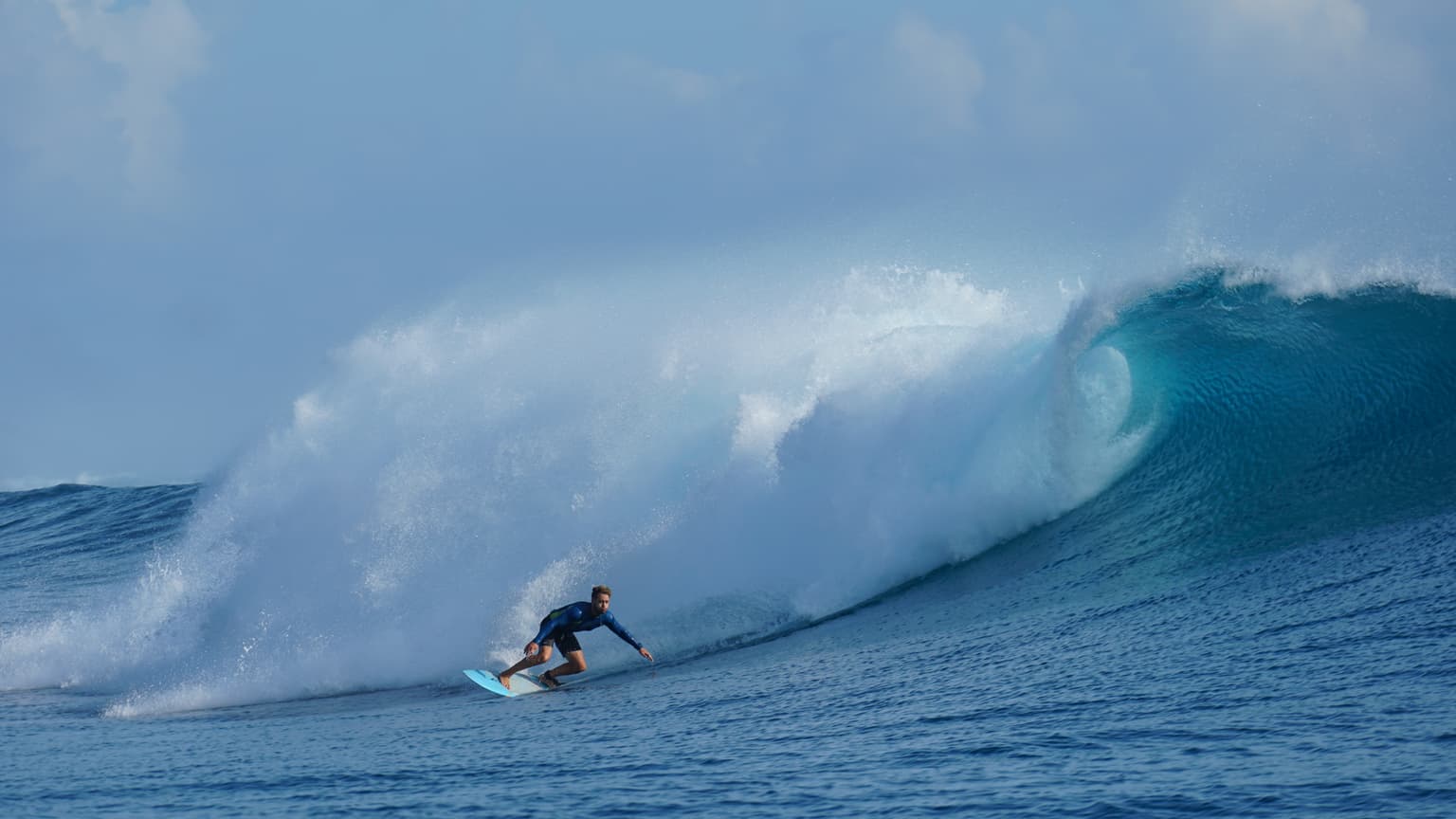 Alex surfing at Cemetery Siargao Island big wave
