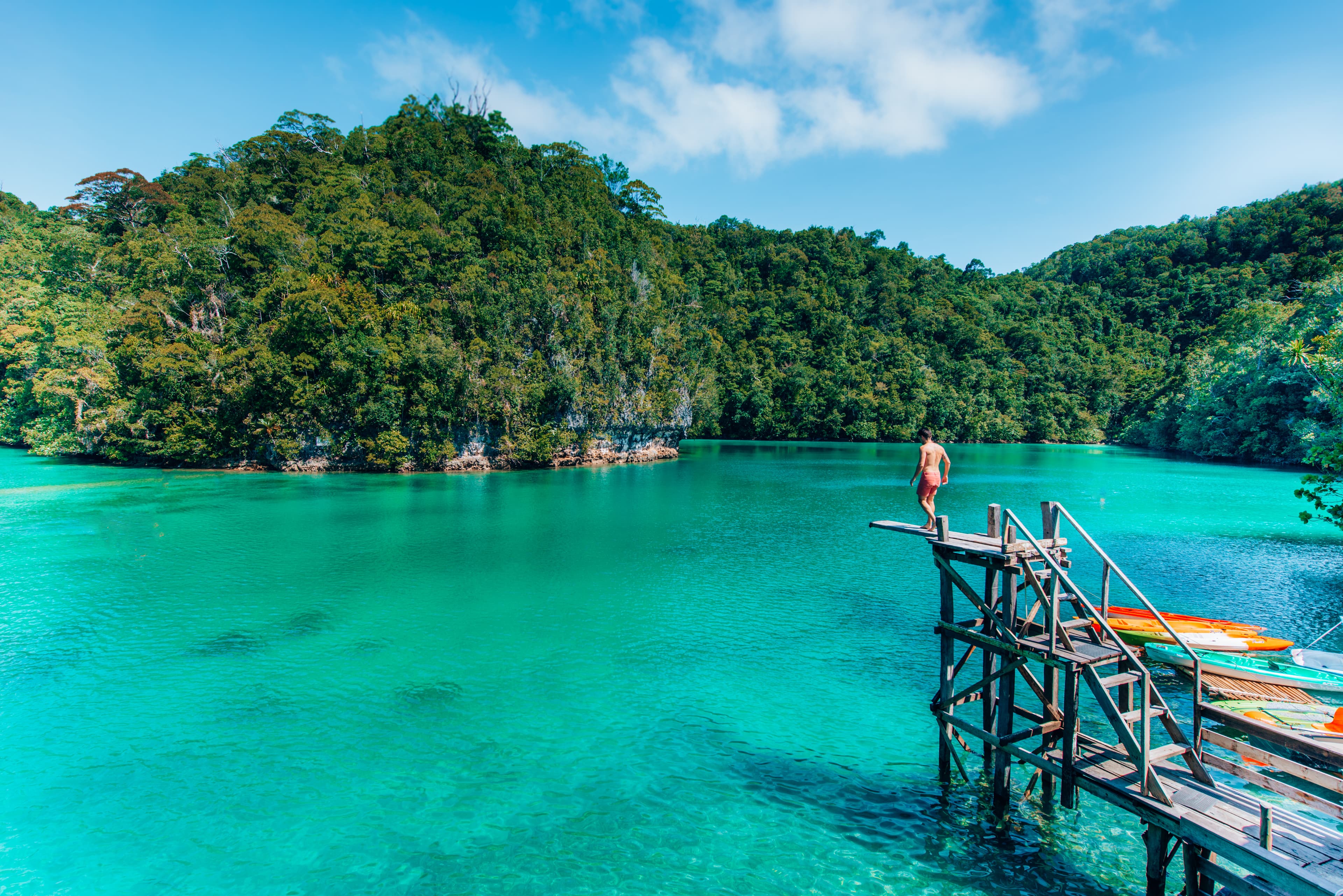 Sugba Lagoon turquoise water and wooden boardwalk in Siargao Island Philippines