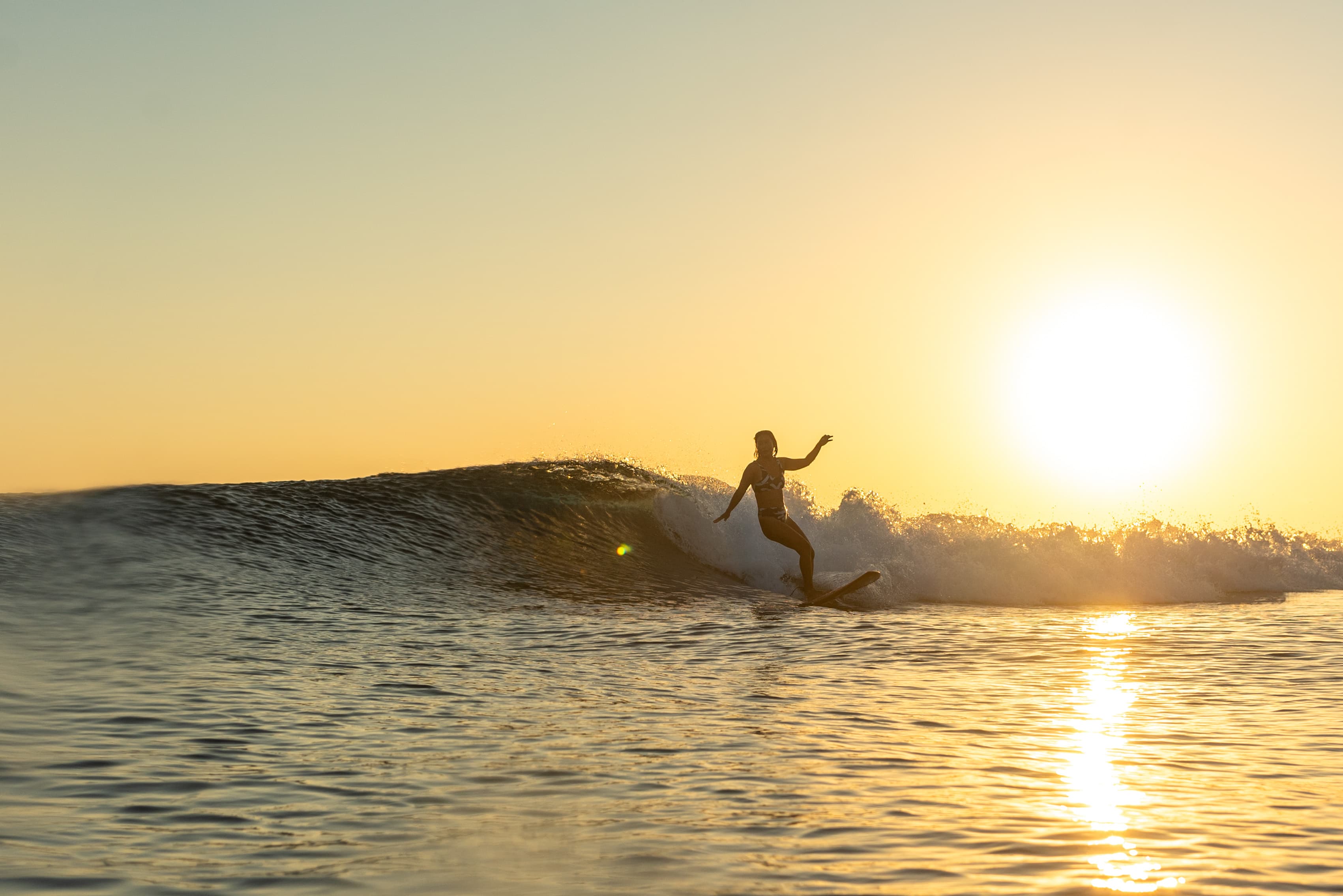 Sunrise surf session in Siargao Island by photographer Mati Olivieri